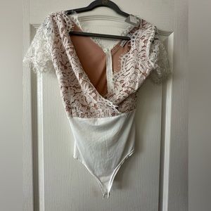 Lace and nude body suit snap bottom size S